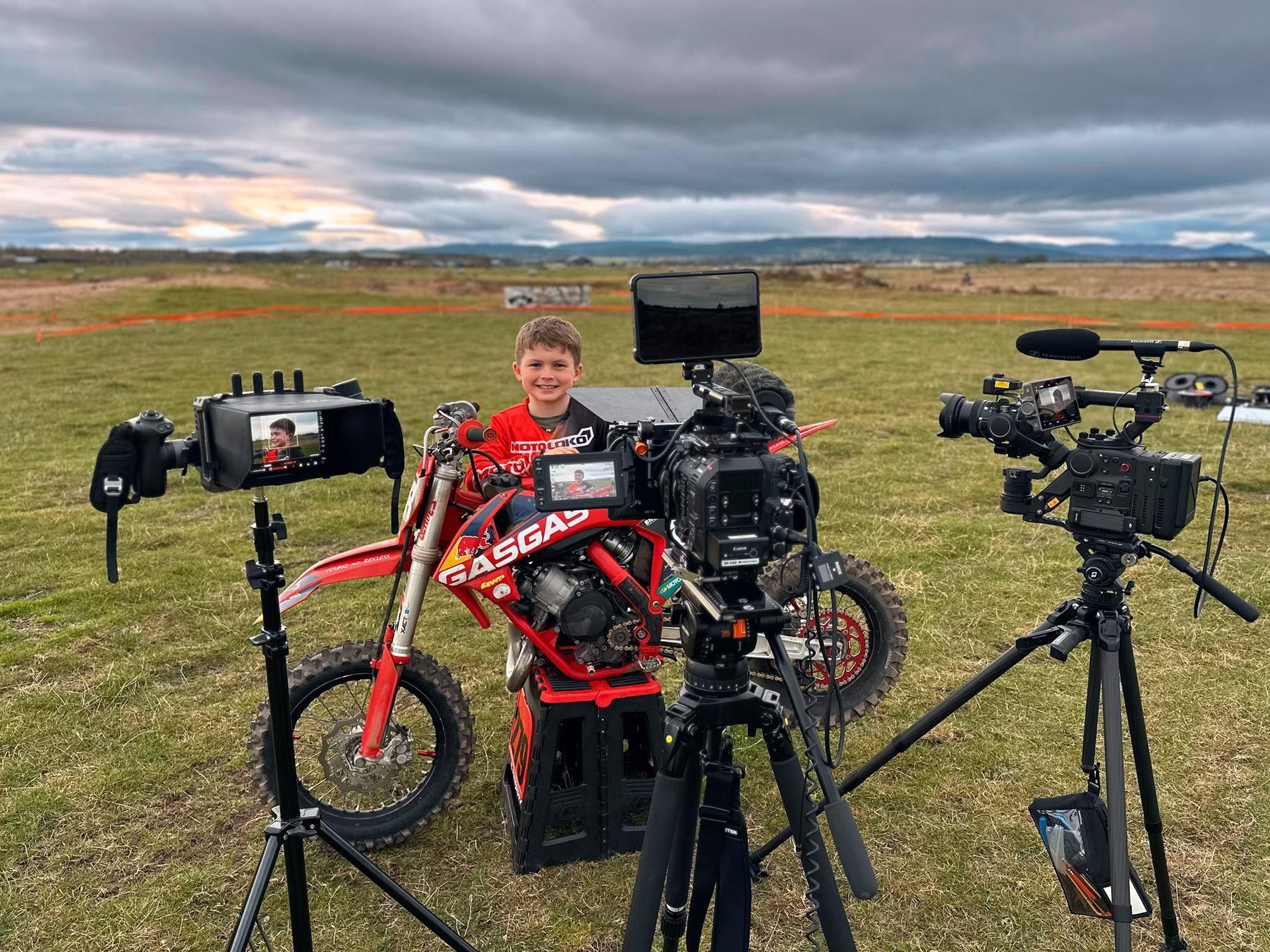 Braap Scotland race-day filming setup with cameras and youth rider